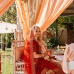 "Bride in traditional Indian attire during a vibrant wedding ceremony", wedding co-ordination East Rand